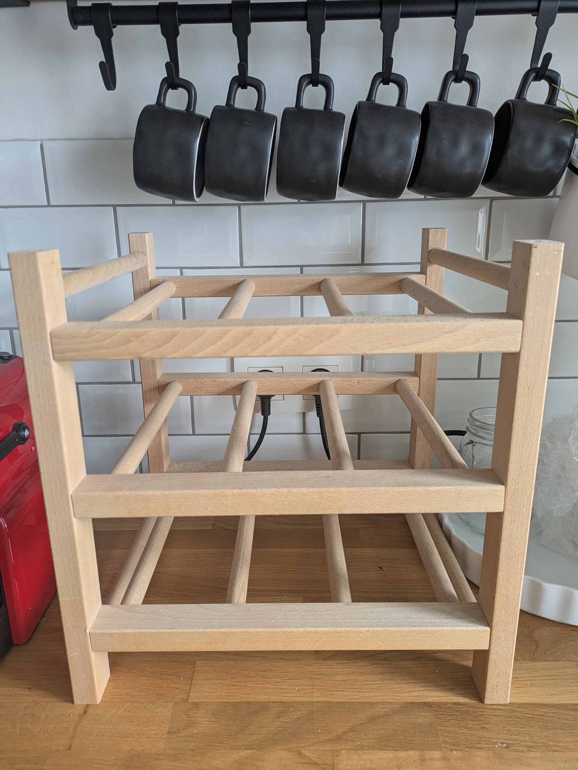 HUTTEN 9-bottle wine rack, solid wood
