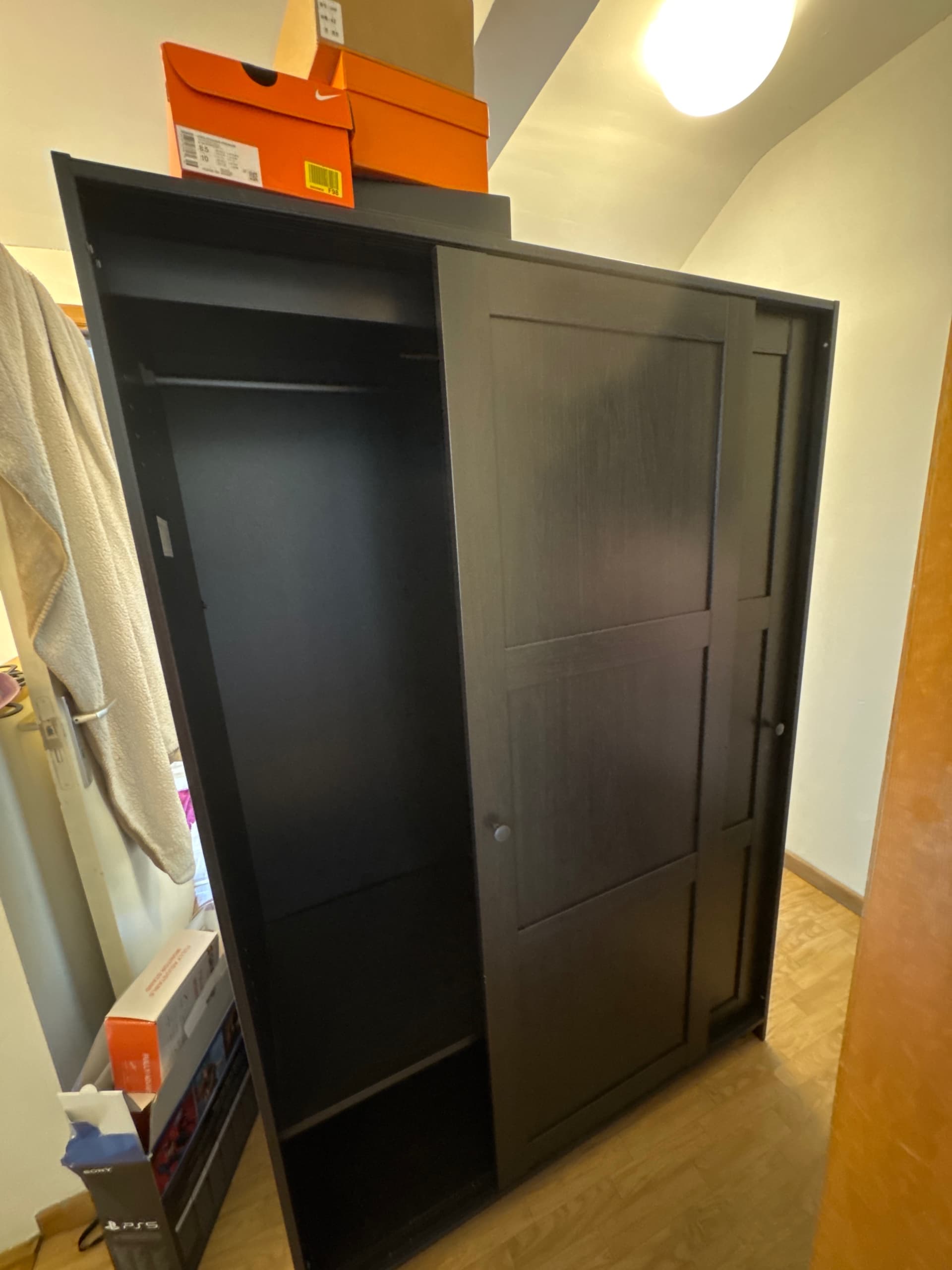RAKKESTAD armoire à portes coulissantes, brun noir, 117x176 cm
