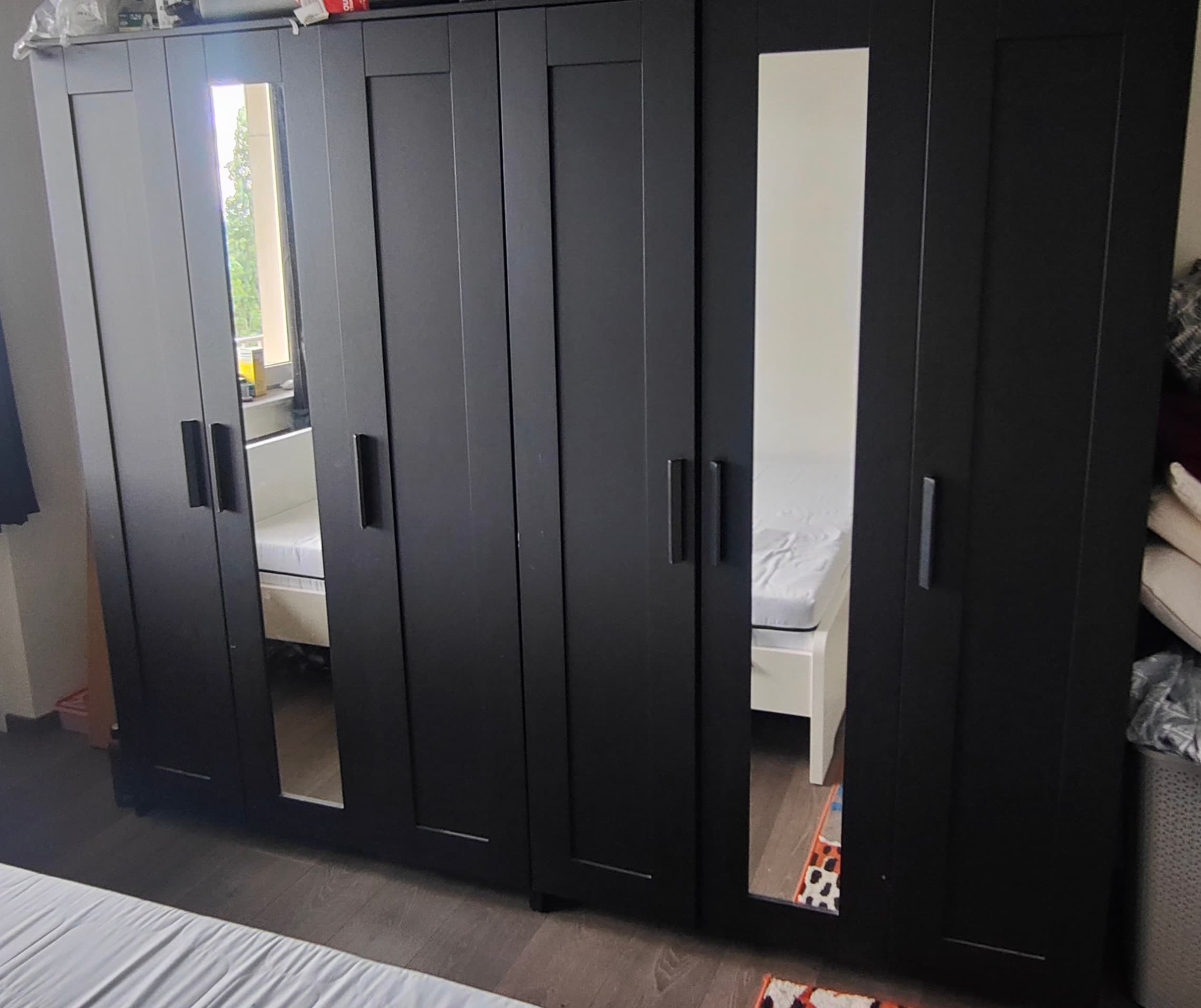 BRIMNES wardrobe with 3 doors, black, 117x50x190 cm