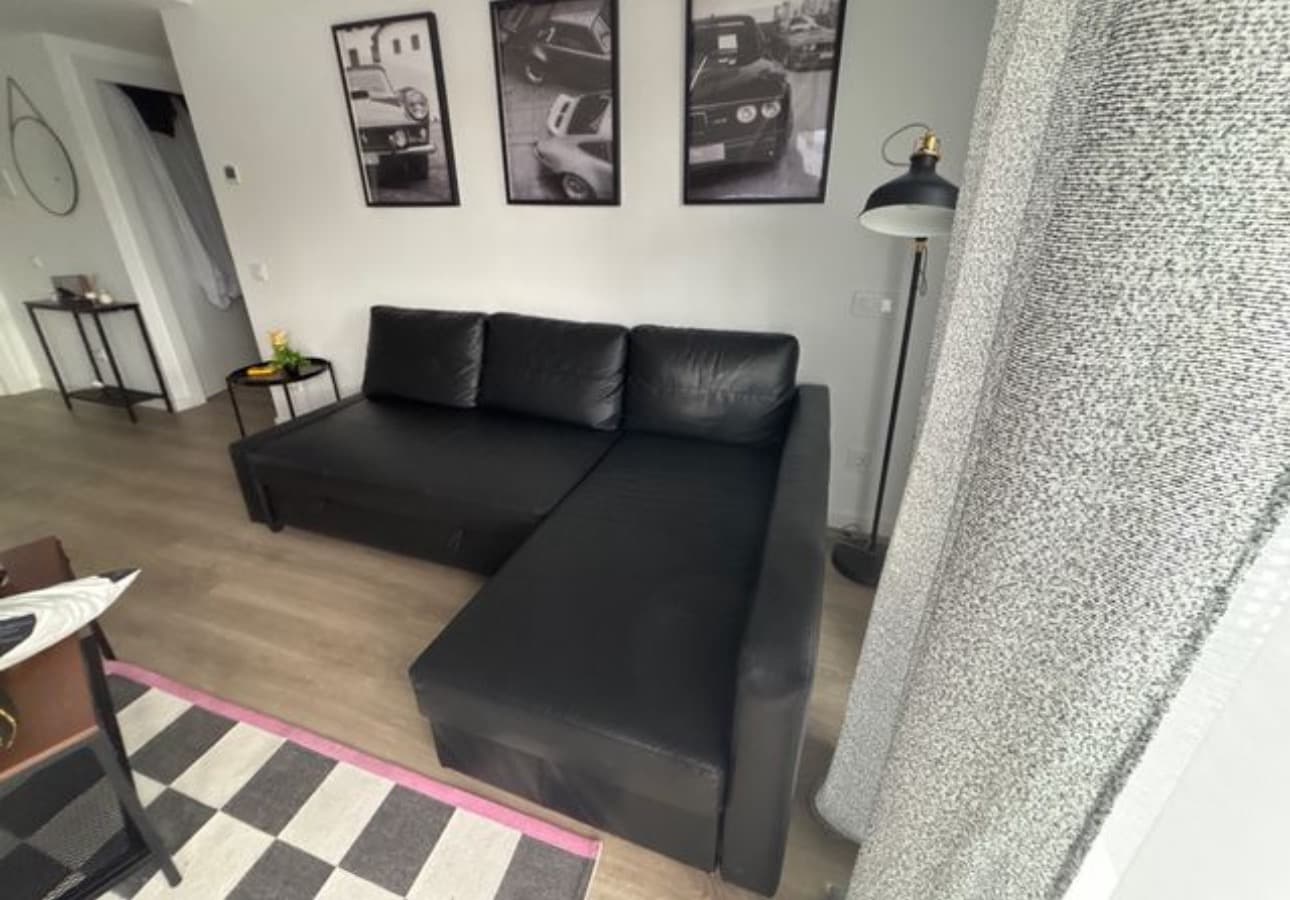 FRIHETEN sofá cama esquina con almacenaxe, Bomstad negro