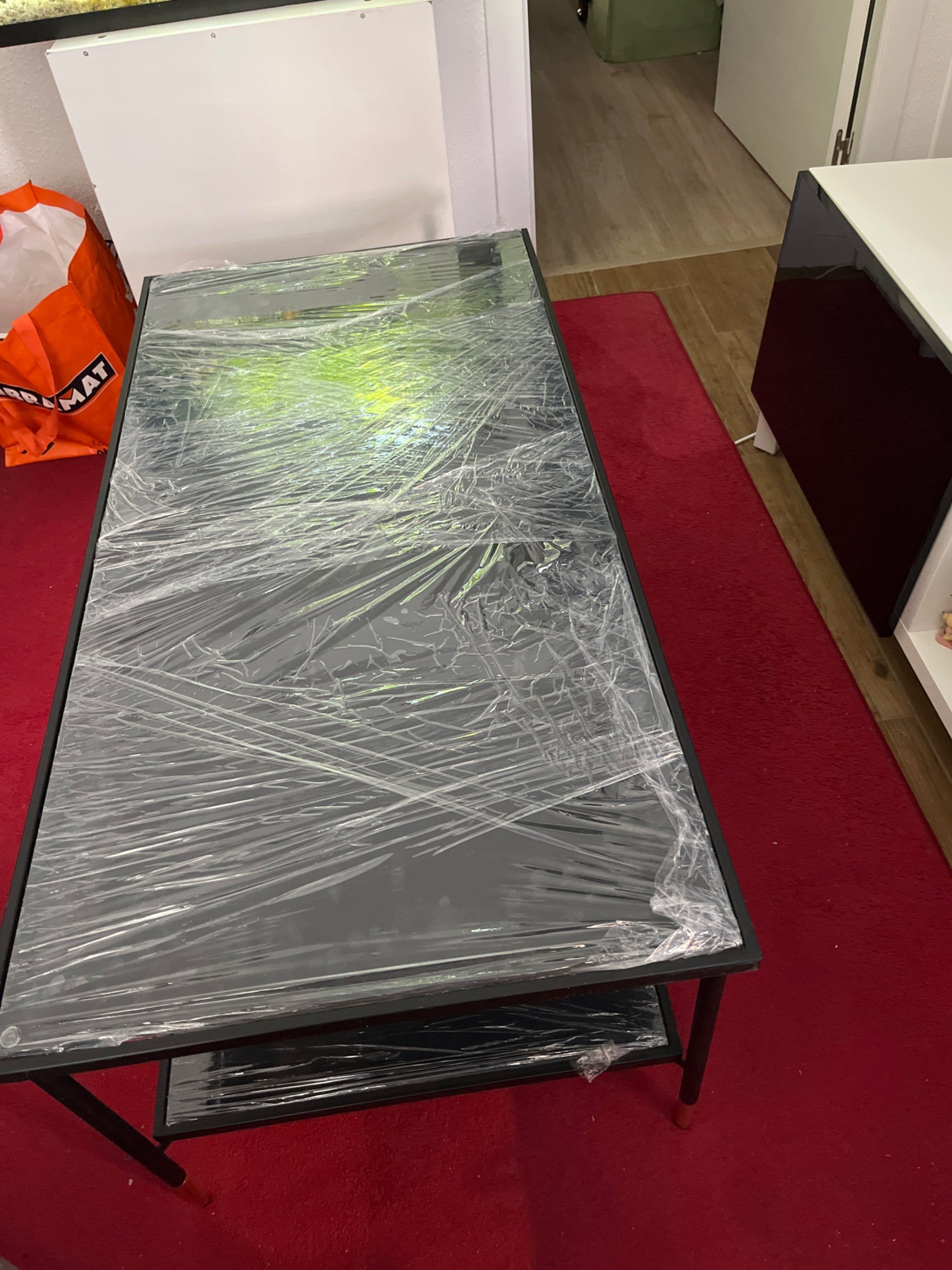 ÄSPERÖD mesa de centro, negro/vidrio negro, 115x58 cm