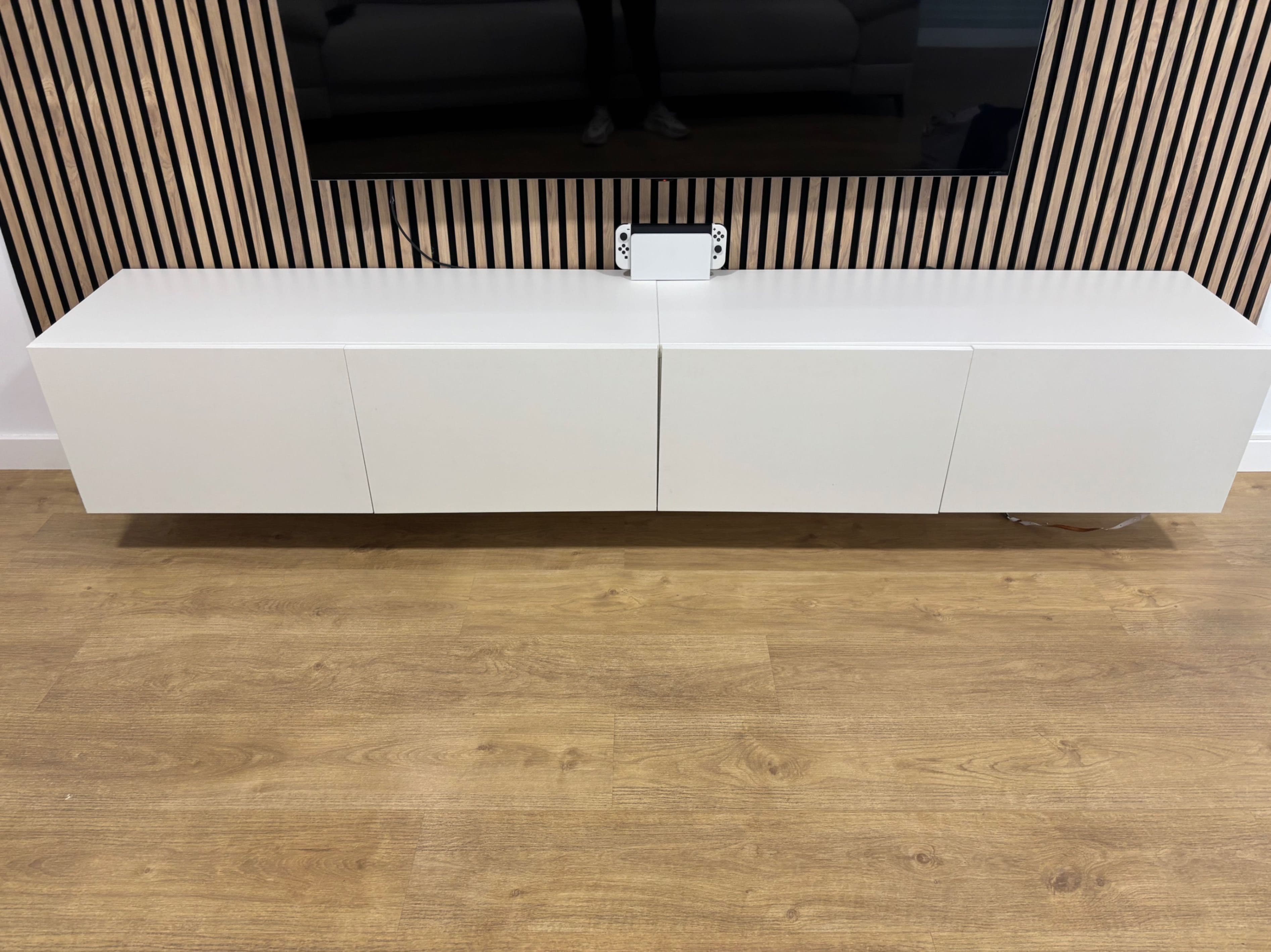 BESTÅ TV bench with doors, white Västerviken/Stubbarp/white, 120x42x48 cm
