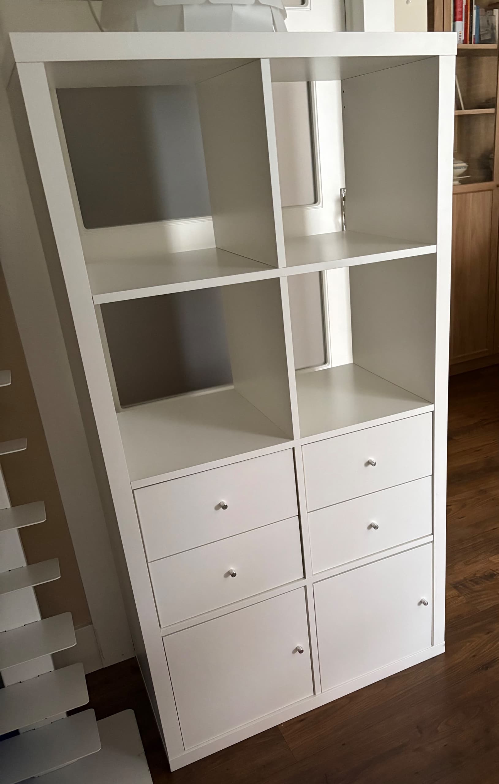 KALLAX shelving unit with 4 inserts, white, 147x77 cm