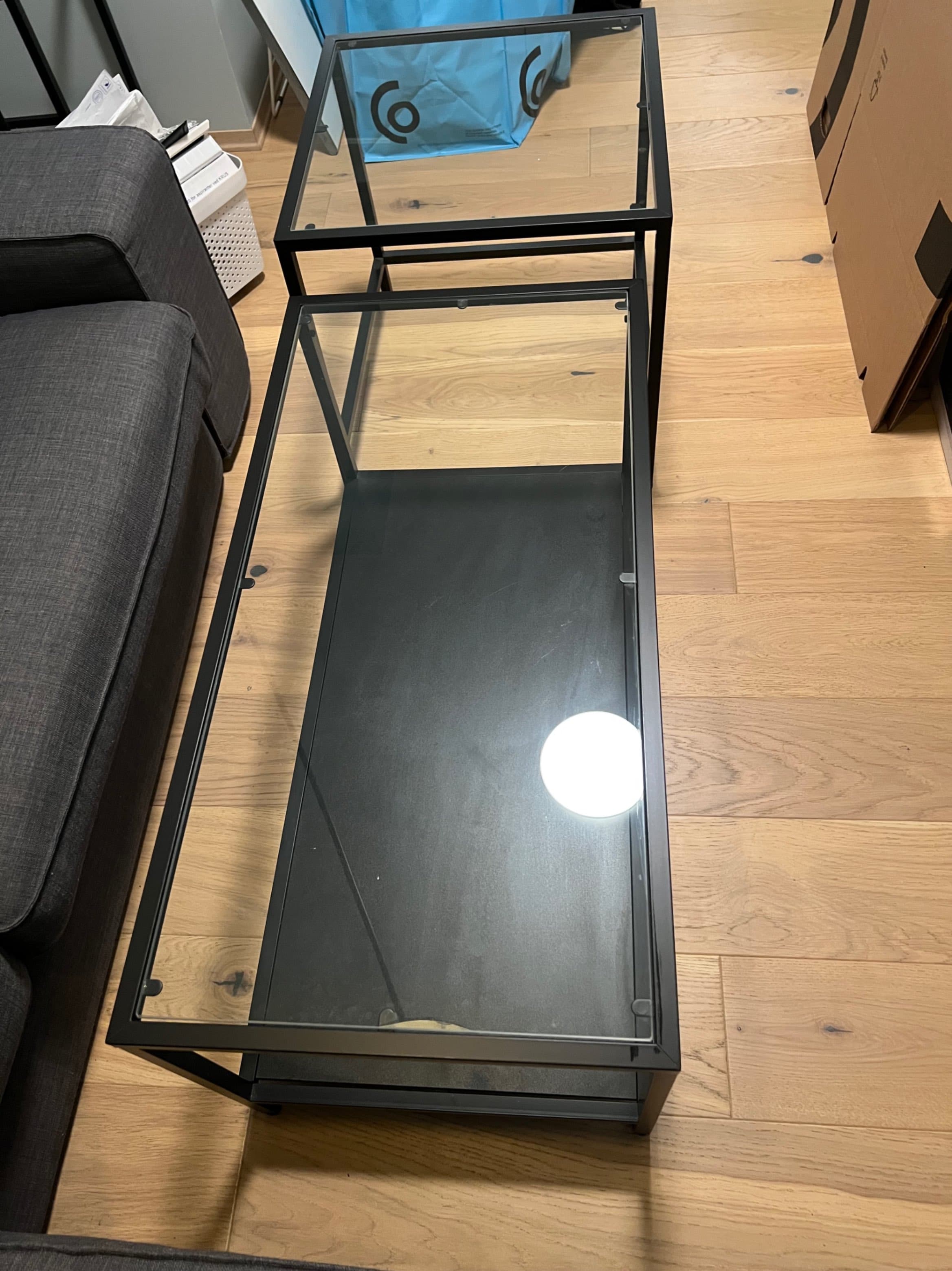 VITTSJÖ nest of tables, set of 2, black-brown/glass, 90x50 cm