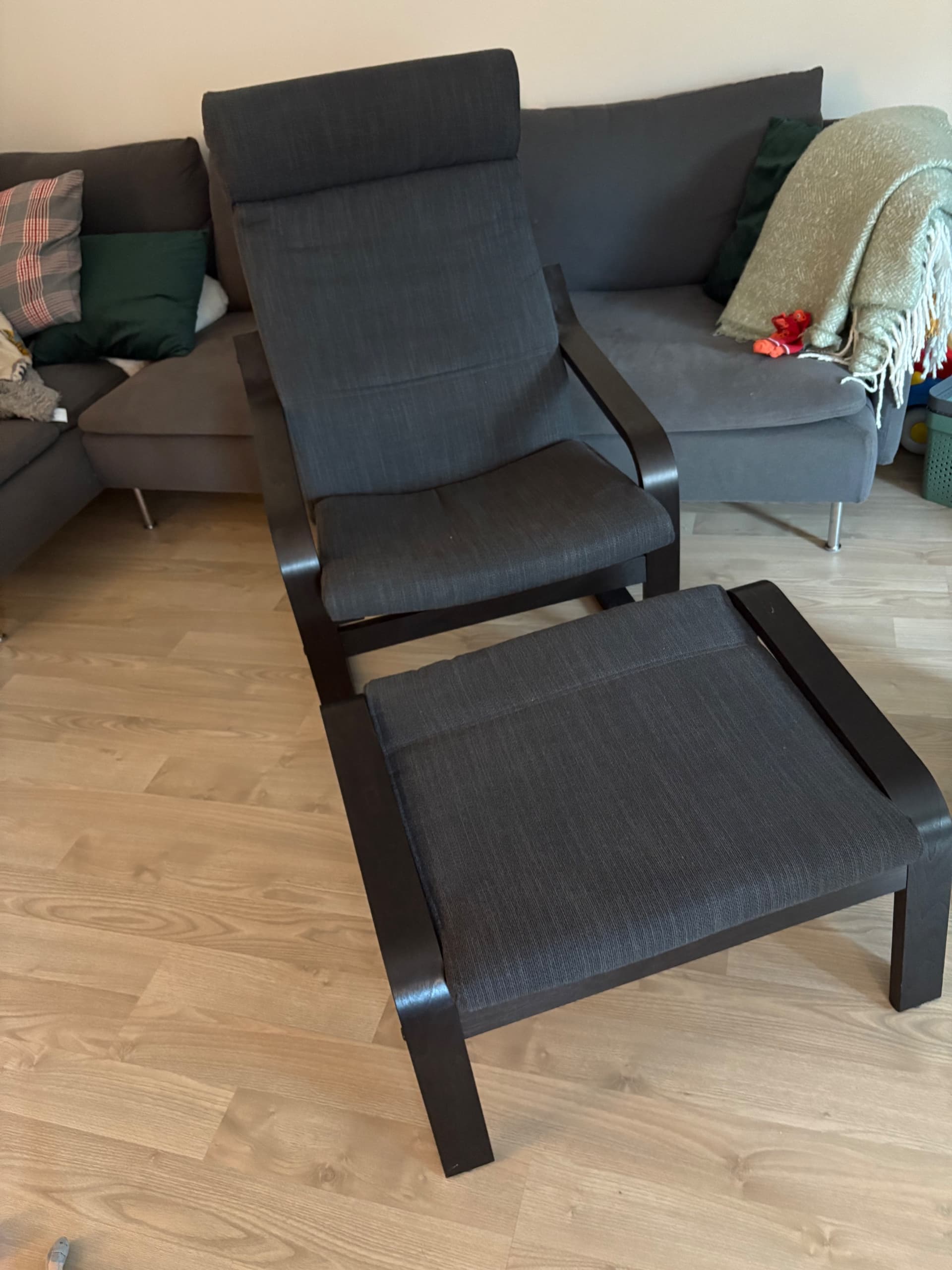 POÄNG armchair and footstool, black-brown/Hillared anthracite