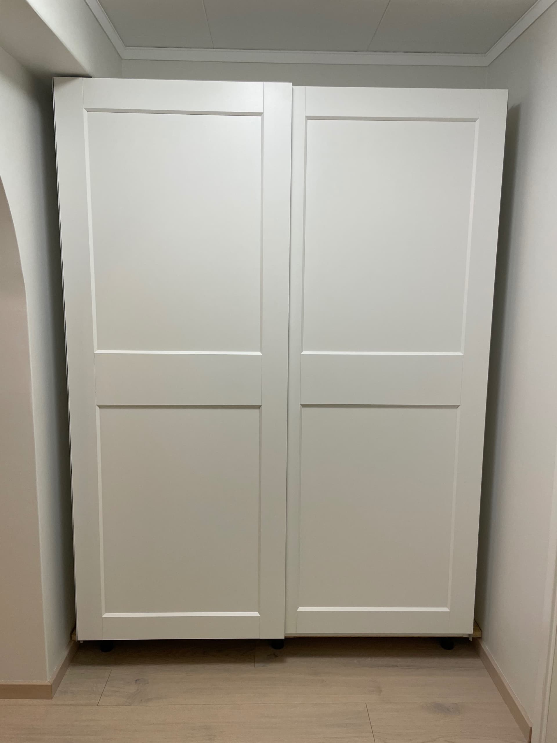 PAX / GRIMO wardrobe with sliding doors, white/white, 150x43x201 cm