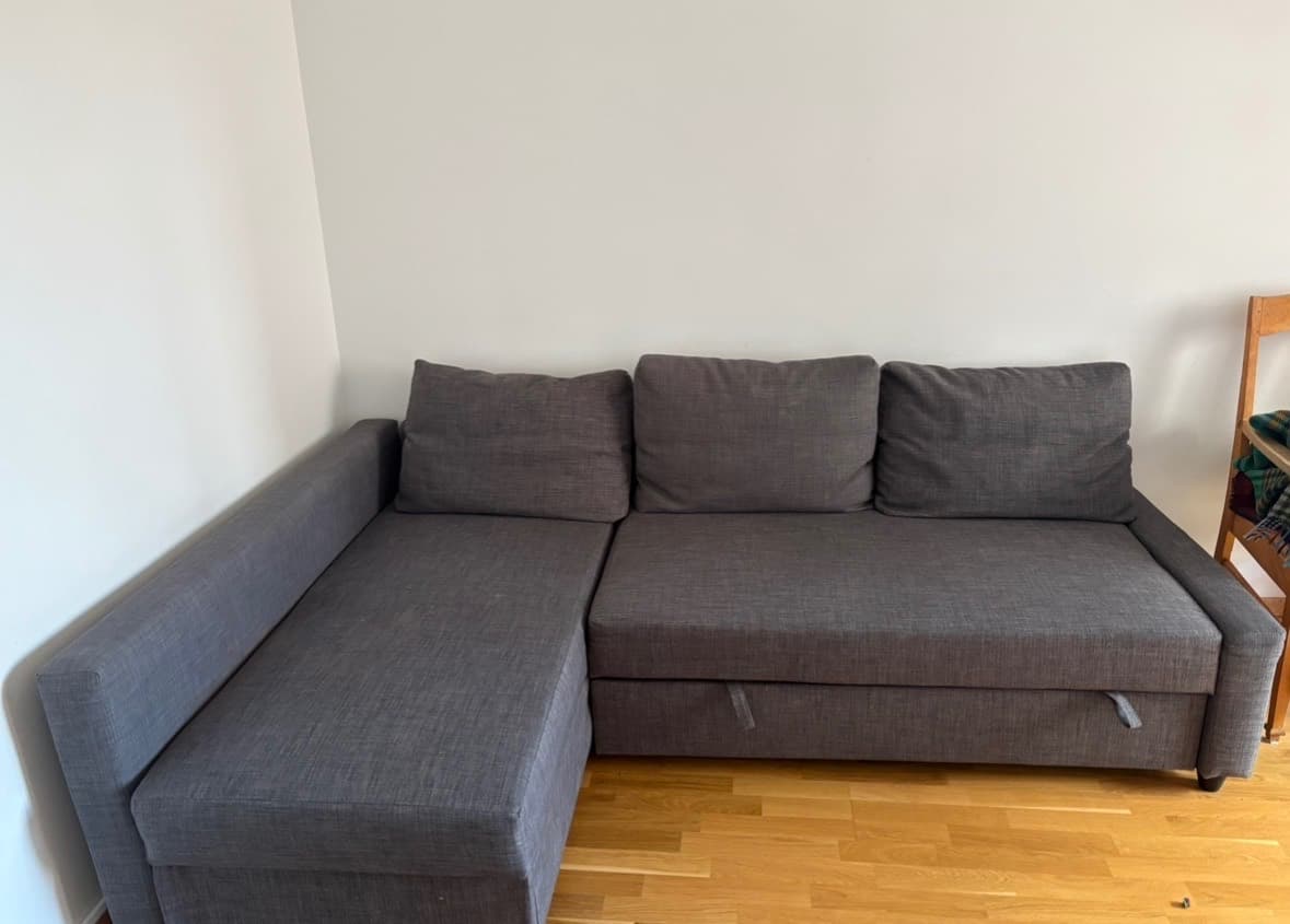 FRIHETEN corner sofa-bed with storage, Skiftebo dark grey