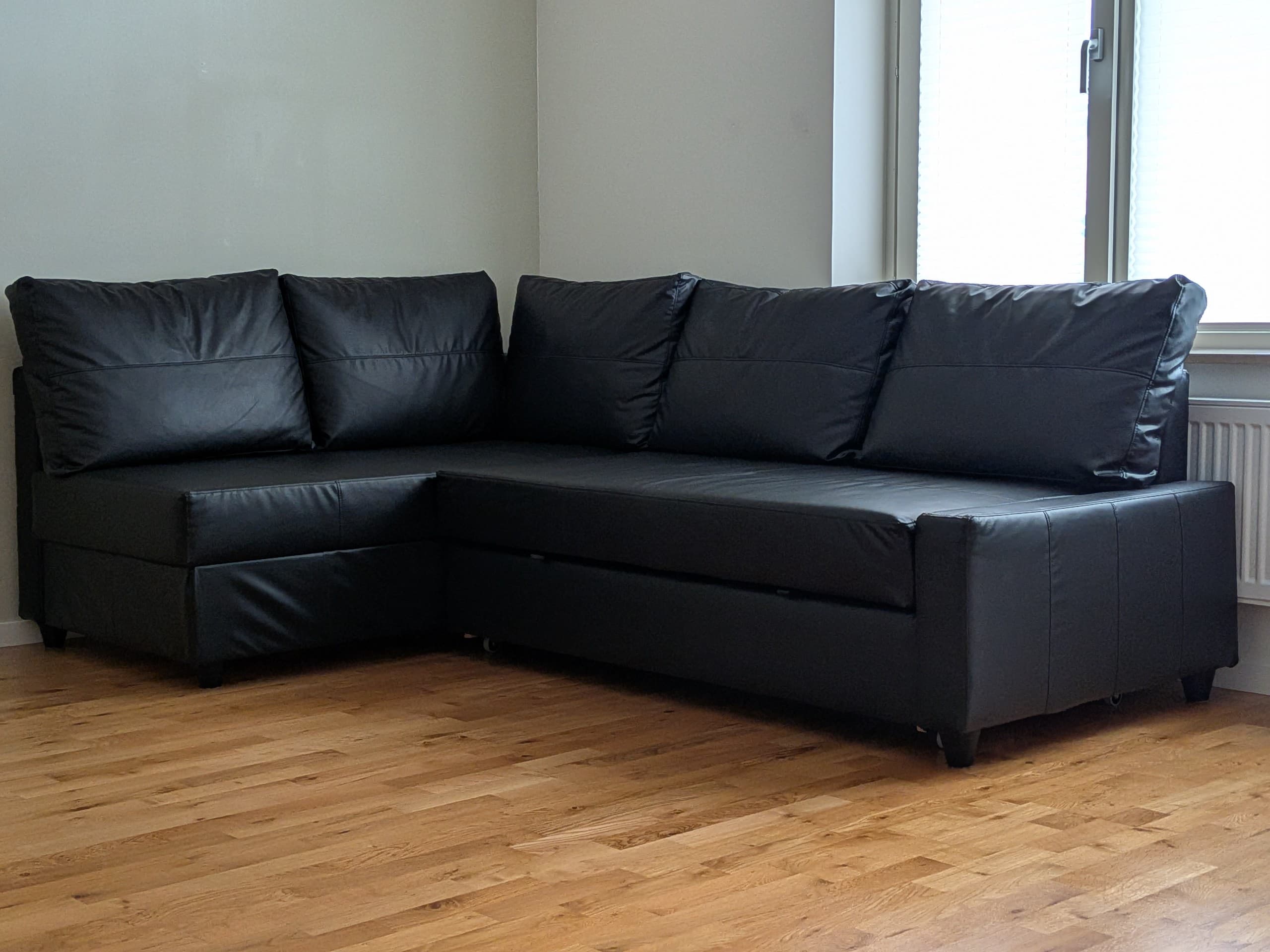 FRIHETEN BÄDDSOFFA corner sofa-bed with storage, with extra back cushions/Bomstad black