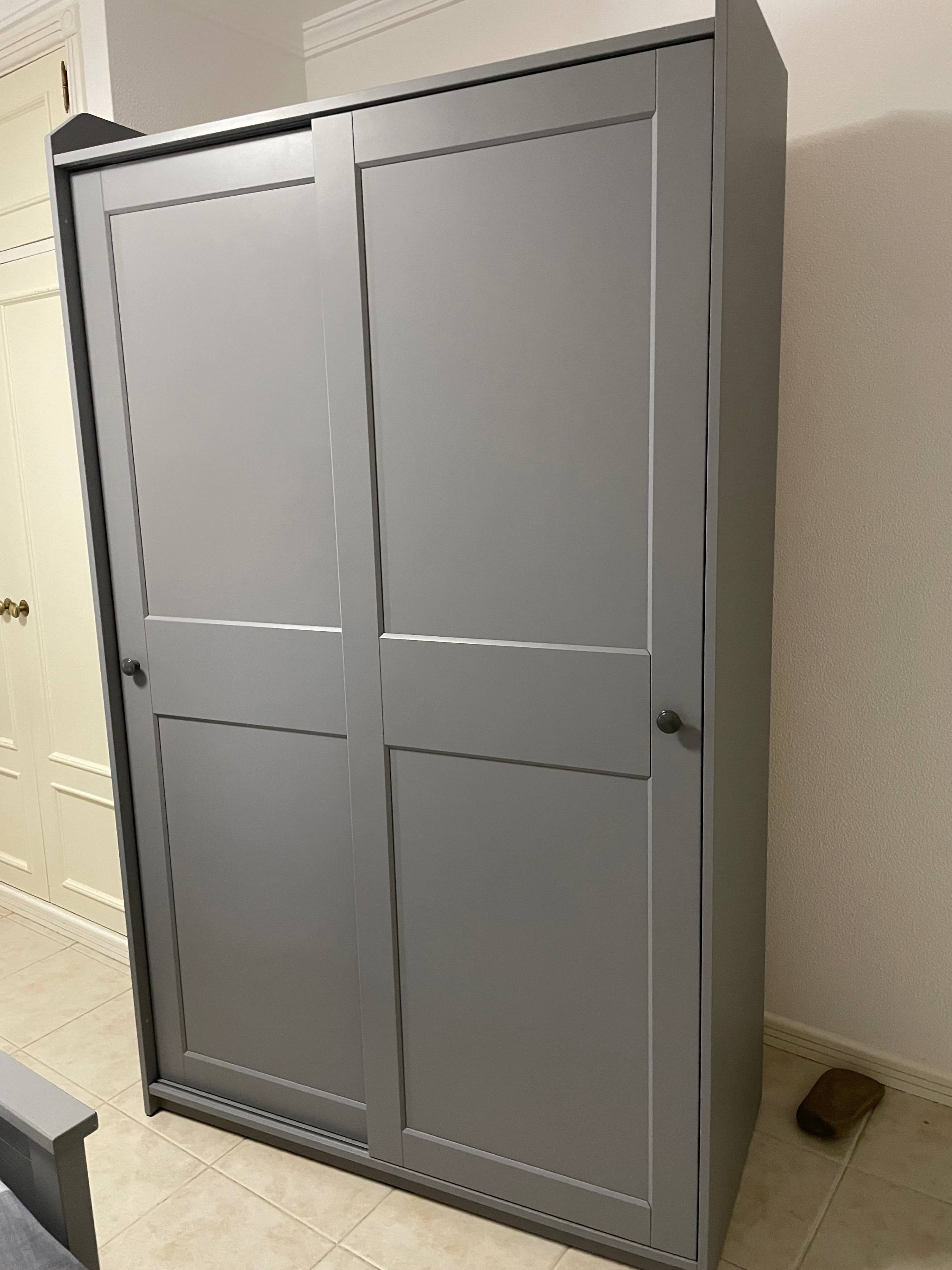 HAUGA wardrobe with sliding doors, grey, 118x55x199 cm