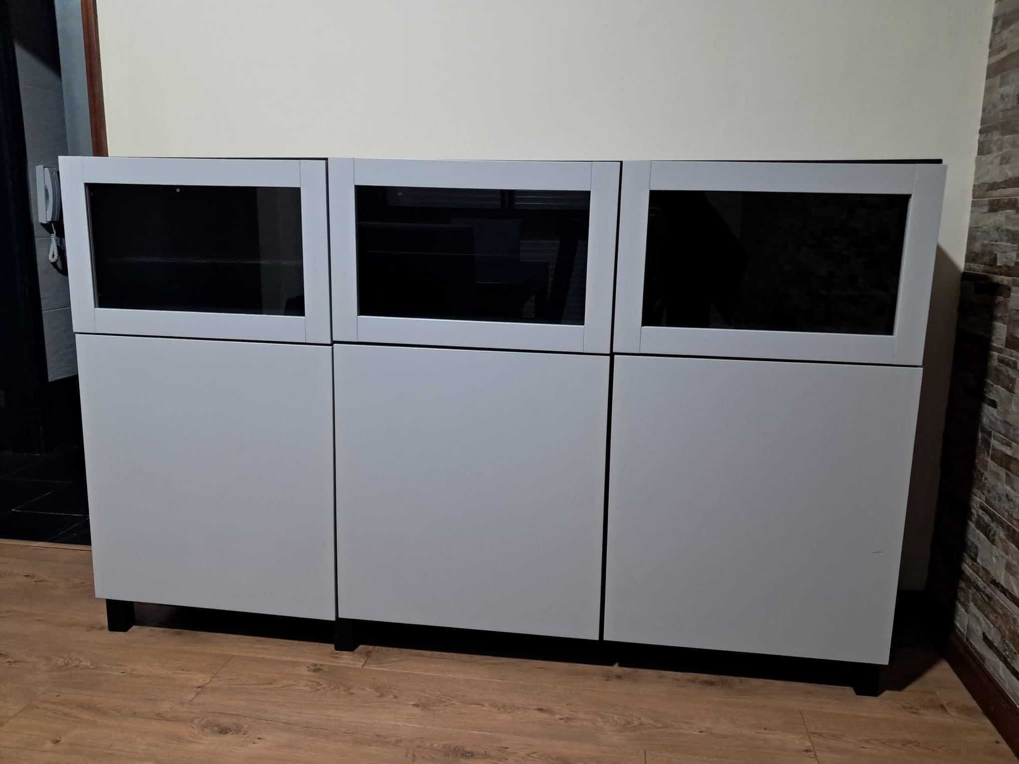 BESTÅ storage combination with doors, black-brown/Krukmakare dark grey-green, 180x42x112 cm