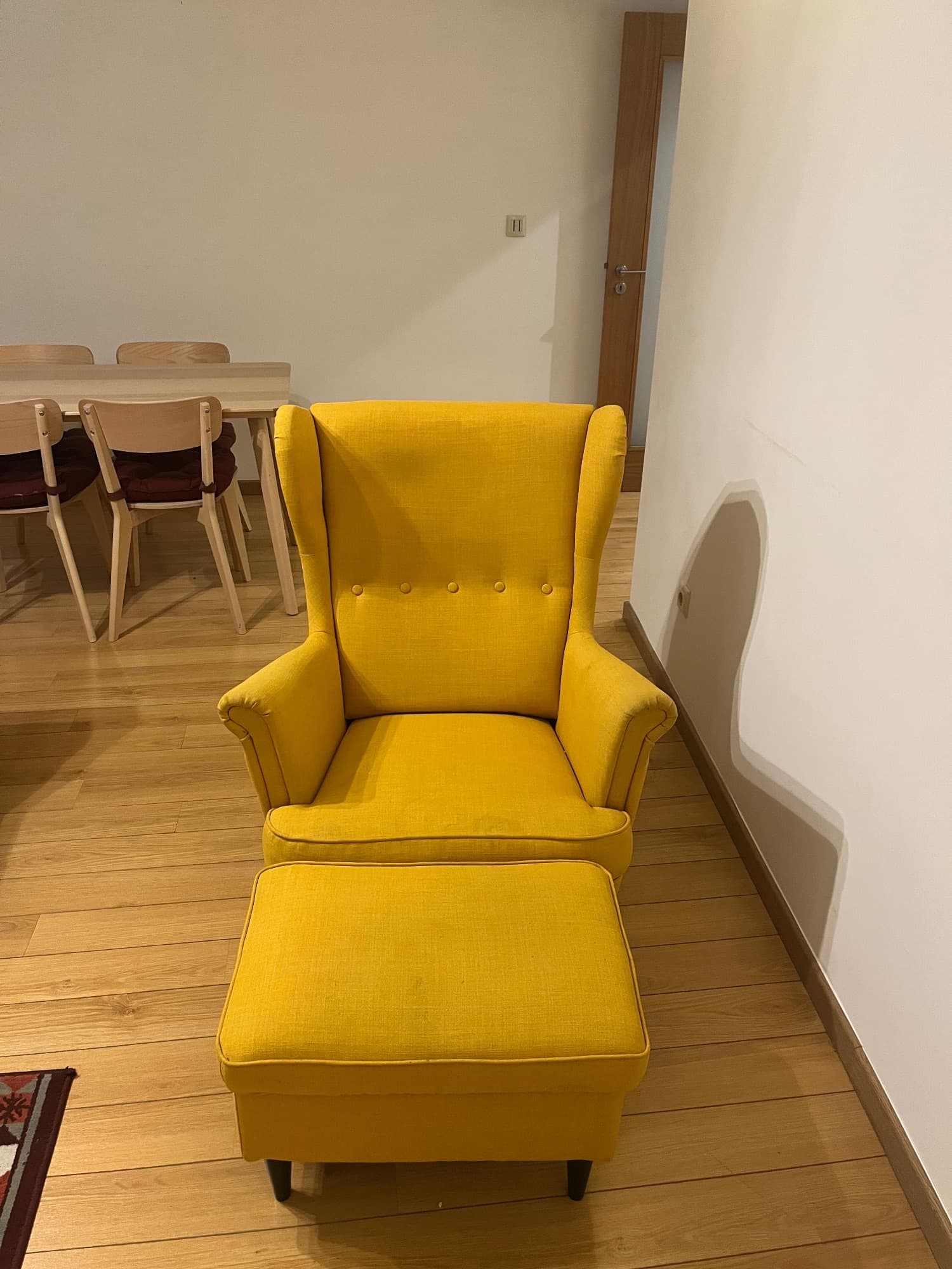 STRANDMON wing chair with footstool, Tibbleby yellow
