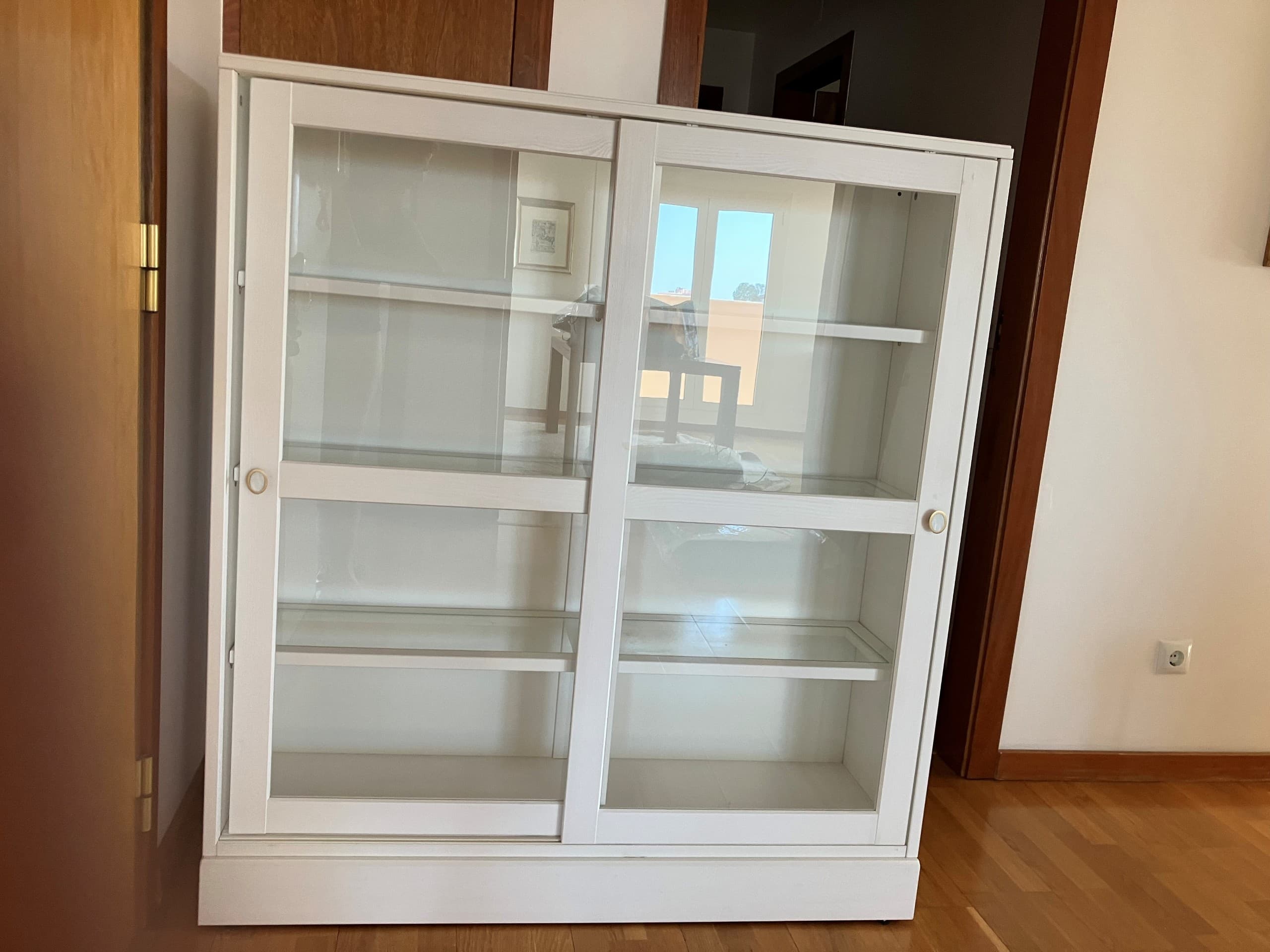 HAVSTA glass-door cabinet with plinth, white clear glass, 121x37x134 cm