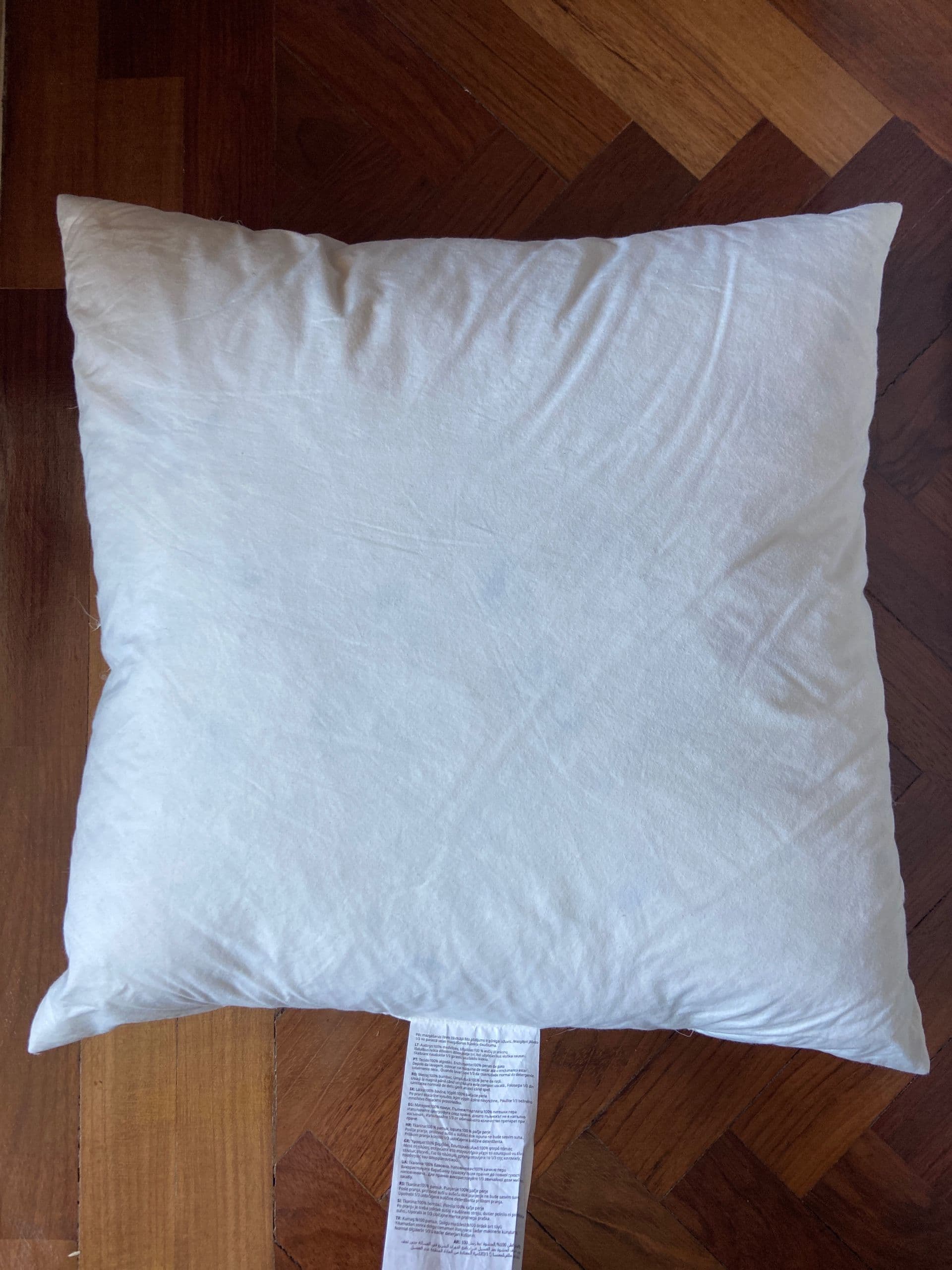 FJÄDRAR cushion pad, off-white, 50x50 cm